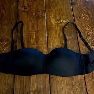 Brand new black bra size size extra large fits like a 38C